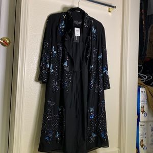 Hand embellished garments by N&T combine carefully selected , sequins and beads